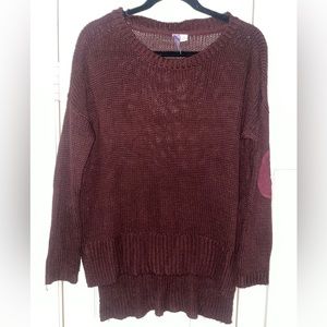 Alya wine colored sweater in Medium.